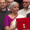 Budget 2024 live: Finance minister Nirmala Sitharaman strikes a pose with the red tablet ahead of Budget presentation