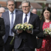 UK PM arriving to pay tribute