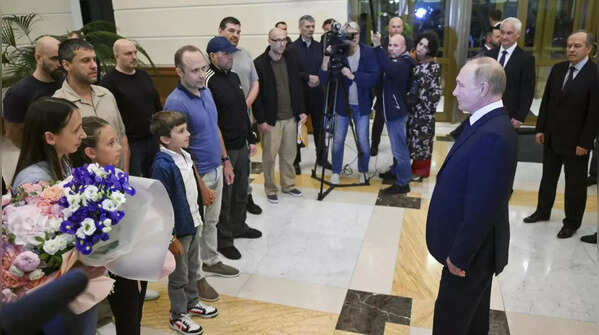 Russian President Putin greets ex-prisoners in Moscow