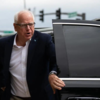 Article image for: 10 things to know about <i class="tbold">tim walz</i> who said 'Black woman kicked his a**' in praise of Harris