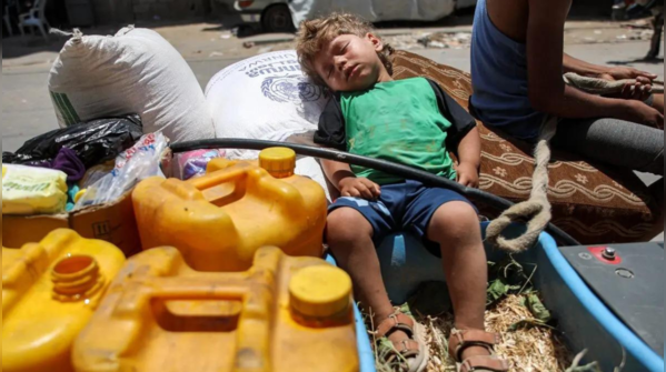 Boy sleeps on sack