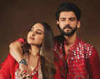 Sonakshi and Zaheer Dazzle in matching red outfits, perfectly coordinating their festive look