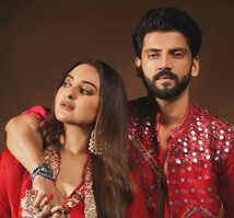 Sonakshi and Zaheer Dazzle in matching red outfits, perfectly coordinating their festive look