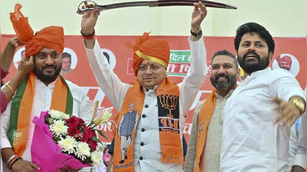 <strong>Pushkar Singh Dhami at a poll rally in Panchkula to support BJP candidates</strong>