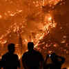 Half a dozen villages evacuated as wildfire surges