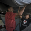 Man setting up shelter
