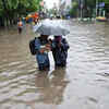Tamil Nadu Rain Live: Pattalam roads submerged following heavy rainfall, leading to knee-deep water accumulation and leaving vehicles stranded in the deluge.