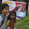 Posters for Kamala in her ancestral village