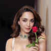 Kiara Advani radiates elegance in a white gown adorned with stunning rose  prints | Times of India