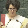 Held constitution in hand, took oath in hindi