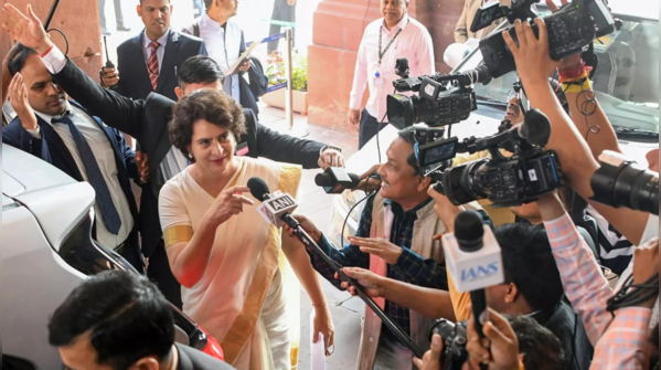Arrives at Parliament, says, 'I am very happy today'"