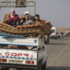 Thousands flee homes