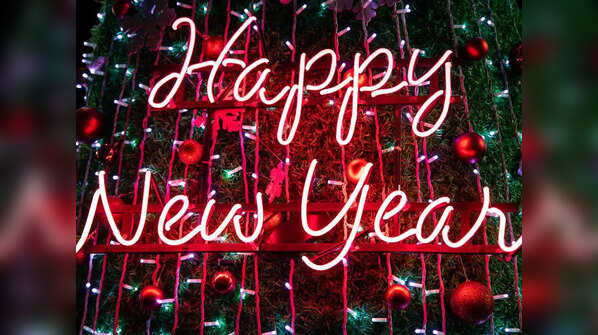 Chinese: 新年快乐 (Xīn nián kuài lè)