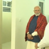 PM Narendra Modi inspects newly constructed flats for the dwellers of Jhuggi Jhopri (JJ) clusters 