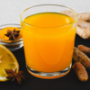 Lemon water with a pinch of turmeric
