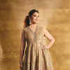 Madhuri Dixit radiates divine grace in a mesmerizing golden ethnic gown |  Times of India