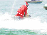 Santa Claus enjoys a jet-ski ride
