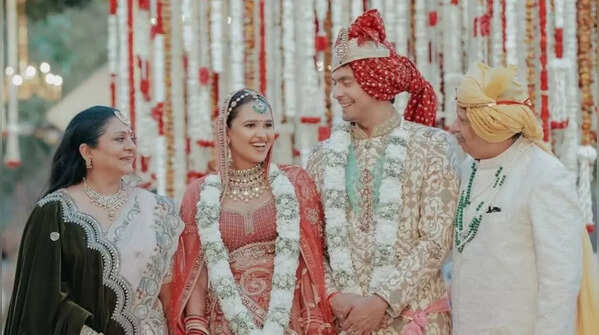 A regal red and gold bridal ensemble