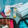 Article image for: Placing travel <i class="tbold">suitcase</i>s on the bed