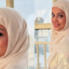 All Smiles in a White Abaya