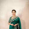 green emerald velvet dress Madhuri Dixit X Dolly J