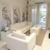 ​A plush white seating area