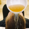 Apple cider vinegar as a hair rinse