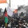 Article image for: <i class="tbold">afghans</i> boil over Koran desecration
