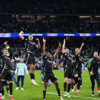 Arsenal Players Celebrate Victory Over Real Madrid in Champions League Quarterfinals