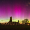 Ruins under auroral radiance
