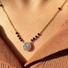Single round-shaped design with floral motifs