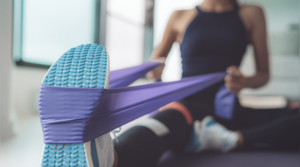 Utilise a pilates ring or resistance bands