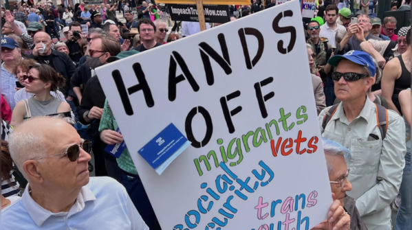 'Hands off migrants, social security'