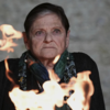 Survivor Monica honors the fallen with light
