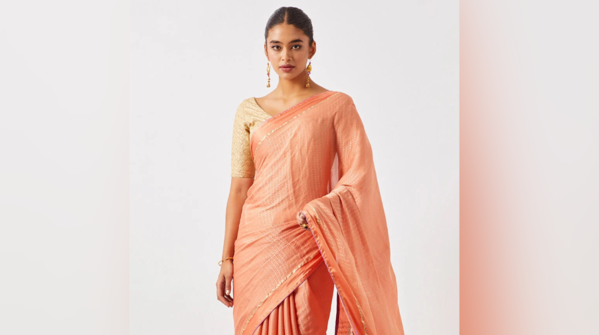 Peach-pink crepe woven saree