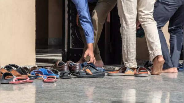 Removing shoes outside any place