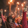 Women protesters lit the night