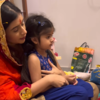 Ziana performs the puja with mom