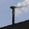 Article image for: <i class="tbold">white smoke</i> billows signifying election of new Pope