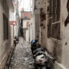 Shattered houses and vehicles