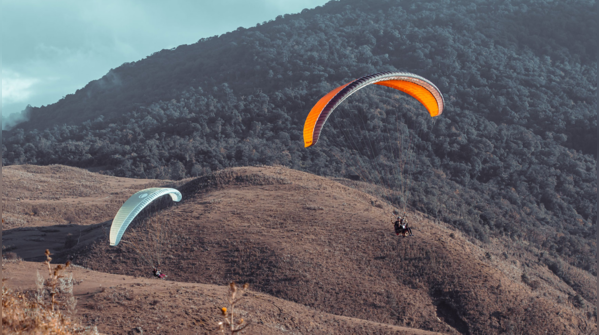 Soaring above Phangrei – Paragliding debuts at Shirui Lily festival 2019