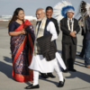 Greeting his hosts at G7 arrival