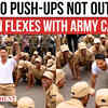 Article image for: Varun Dhawan Stuns With 50 Push-Ups Alongside Army Cadets on <i class="tbold">border 2</i> Set