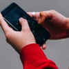 Using both hands and thumbs to hold the phone