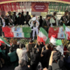 Iranian flags wave 