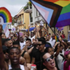 Unyielding voices fill the streets at pride march