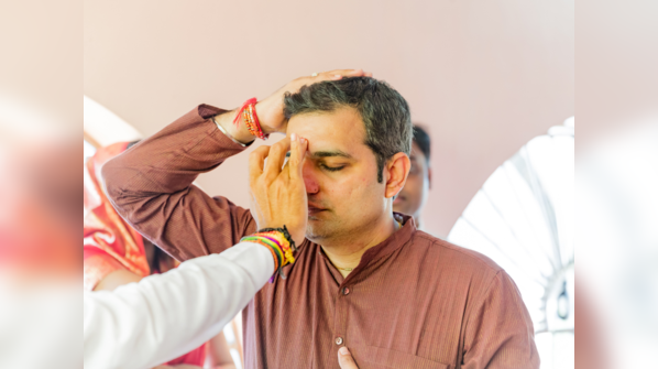 Applying tilak on the forehead stimulates the Ajna chakra