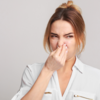 A faint smell or change in urine odour that lingers