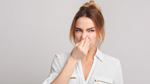 A faint smell or change in urine odour that lingers