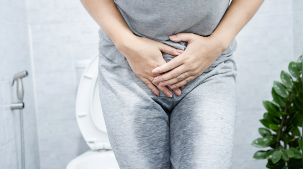 Holding in the urge to urinate, especially while at work or travelling
